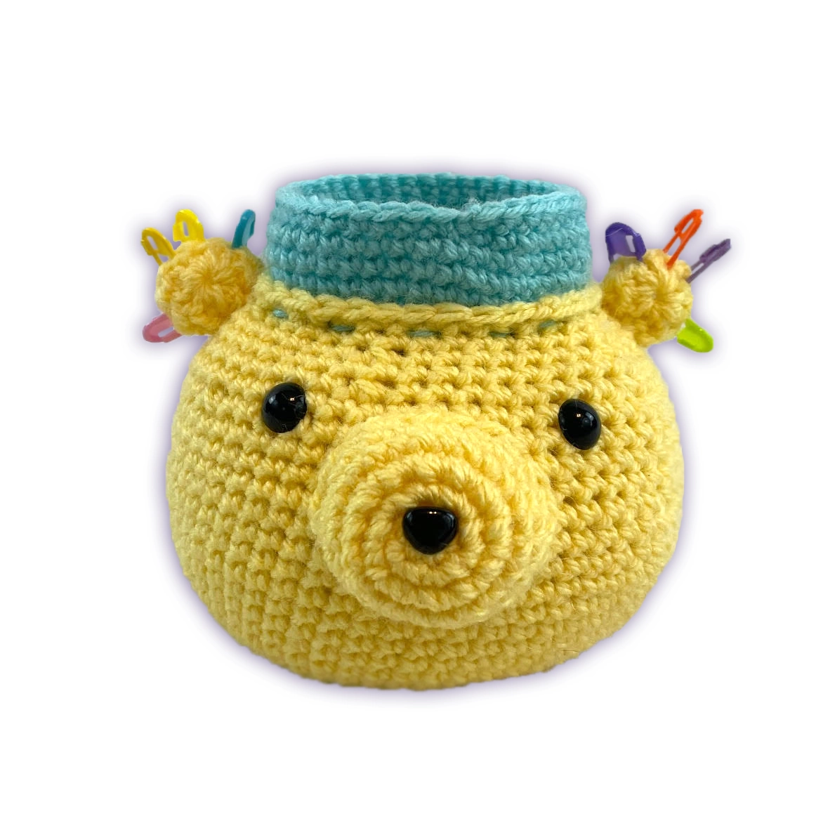 Handmade crochet bear desk organizer, front view, yellow amigurumi pen and craft tool holder
