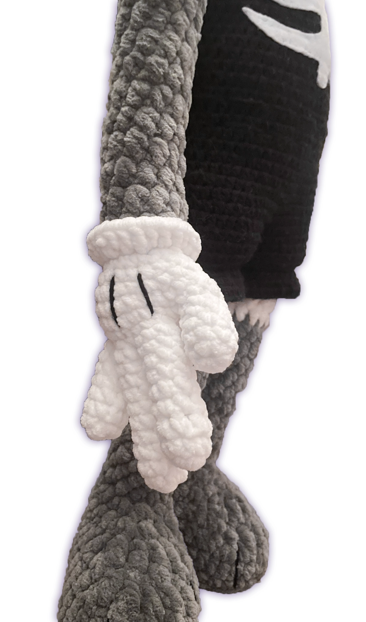 Close-up of crochet fox toon plush side stance, handmade fox body proportions