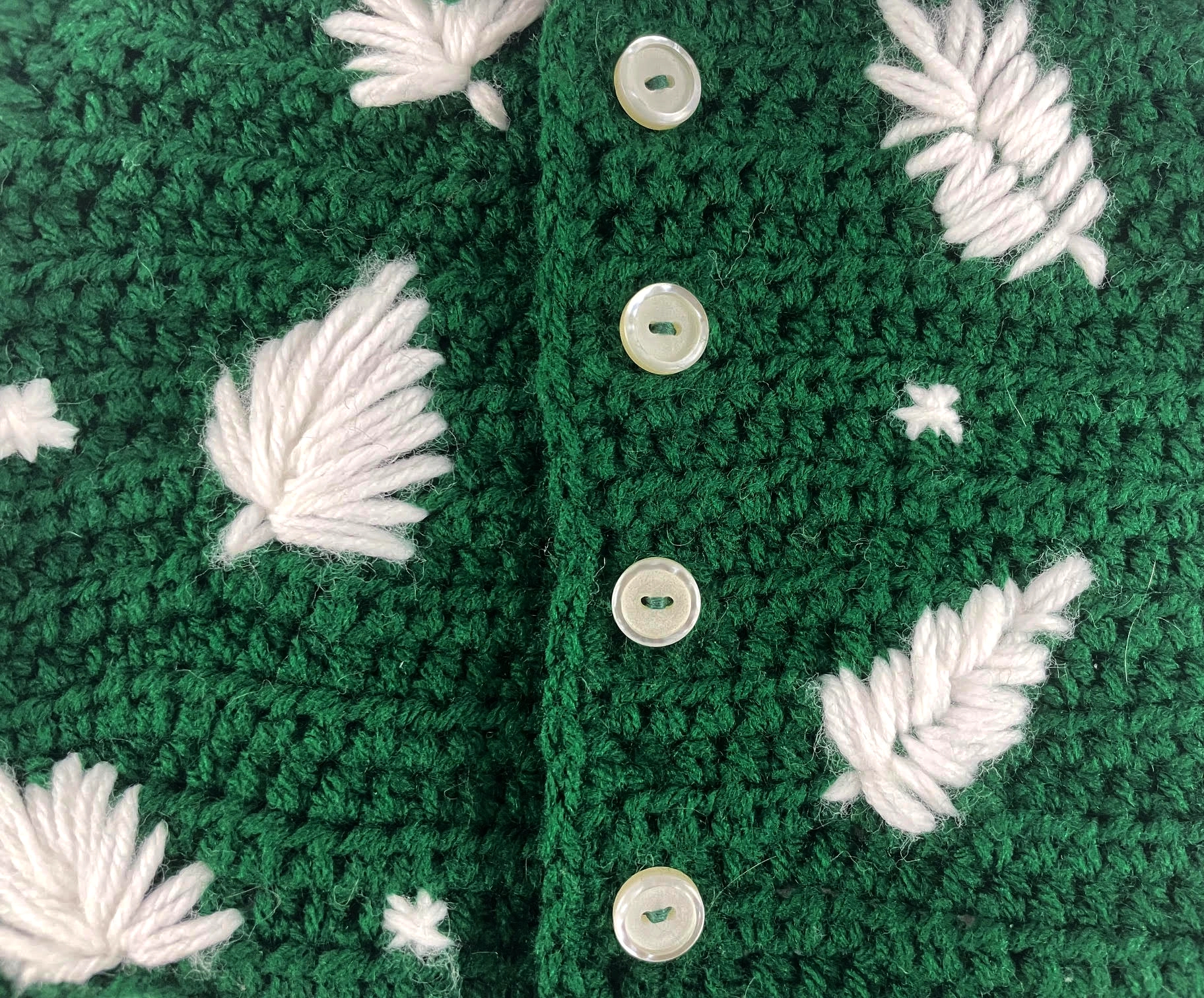 A custom crocheted shirt for a stuffed animal, shown next to the photo reference it was made from. Text reads: "Custom crochet from your reference photo!"