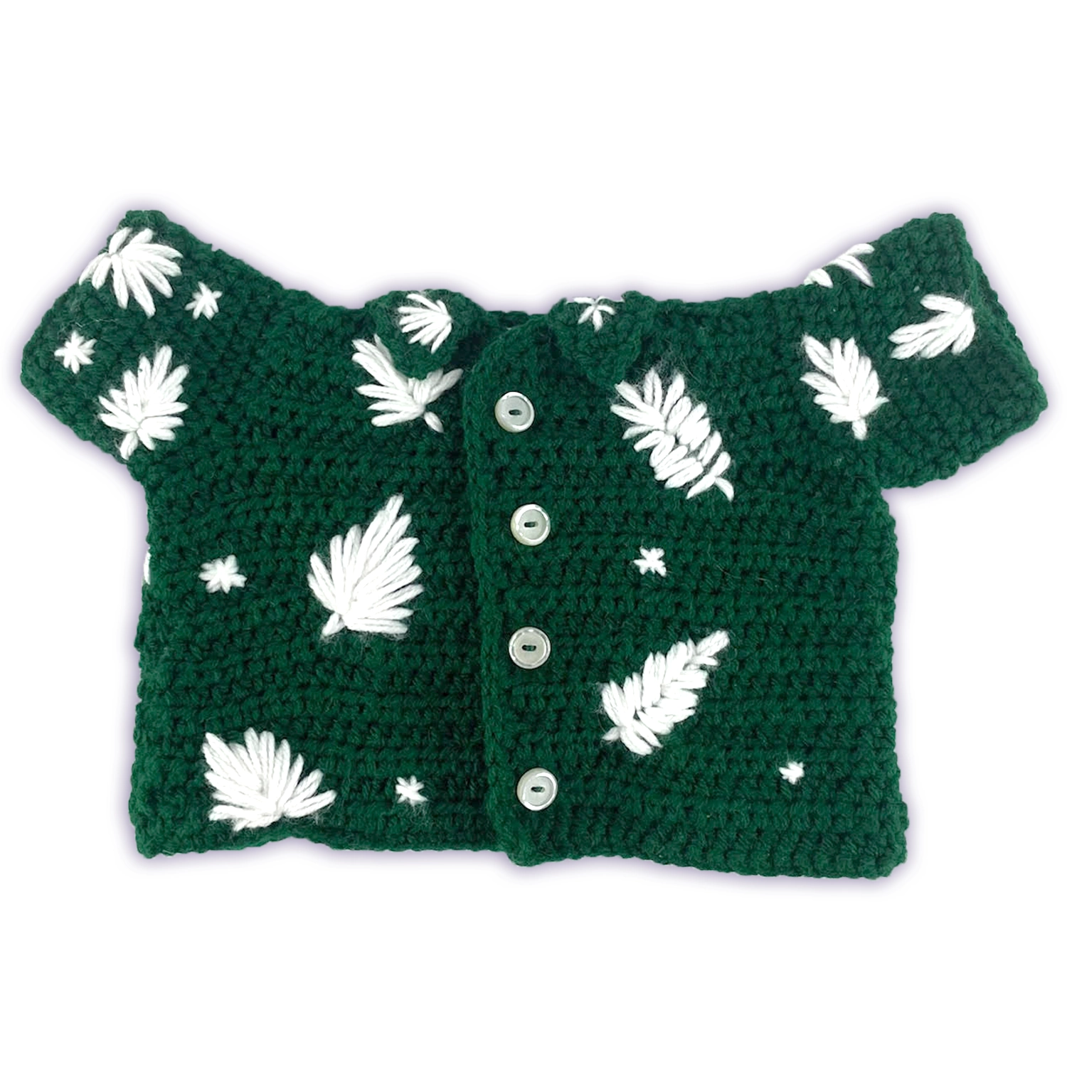 Front view of a green crocheted shirt for a stuffed animal, with small buttons and yarn-stitched leaves.