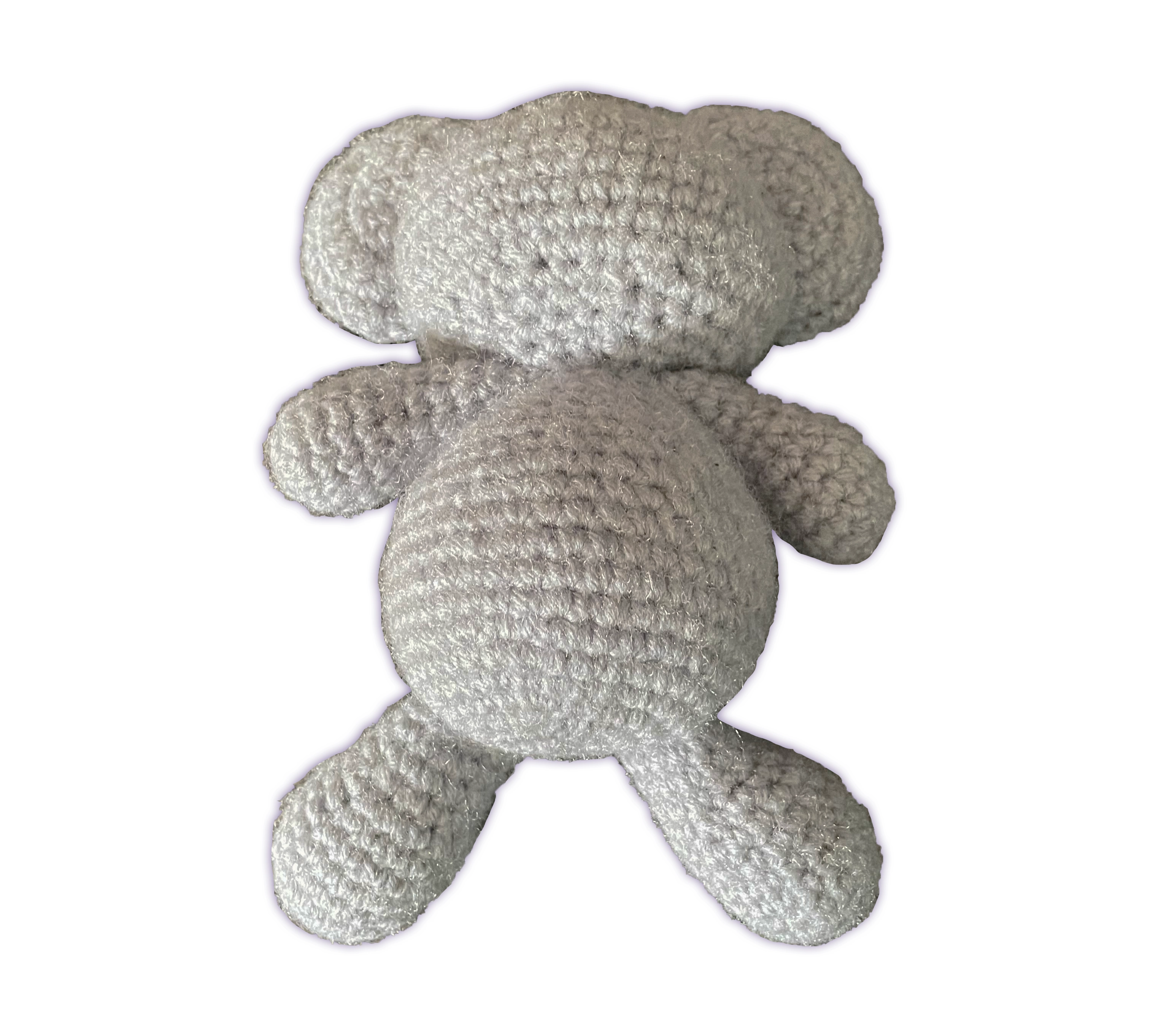 Back view of handmade crochet koala plush, showing stitch detail and tail, small amigurumi design