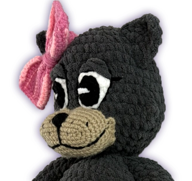 Side view of Pancake crochet toon plush face, handmade toon detail eyelashes