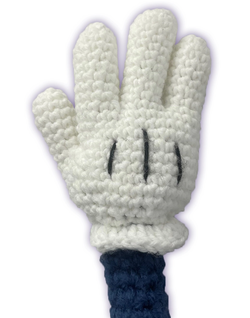 Close-up of crochet Pixie Toontown plush hand, handmade toon glove detail