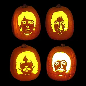 Four carved foam pumpkins featuring the Beatles' faces, Halloween decor thumbnail