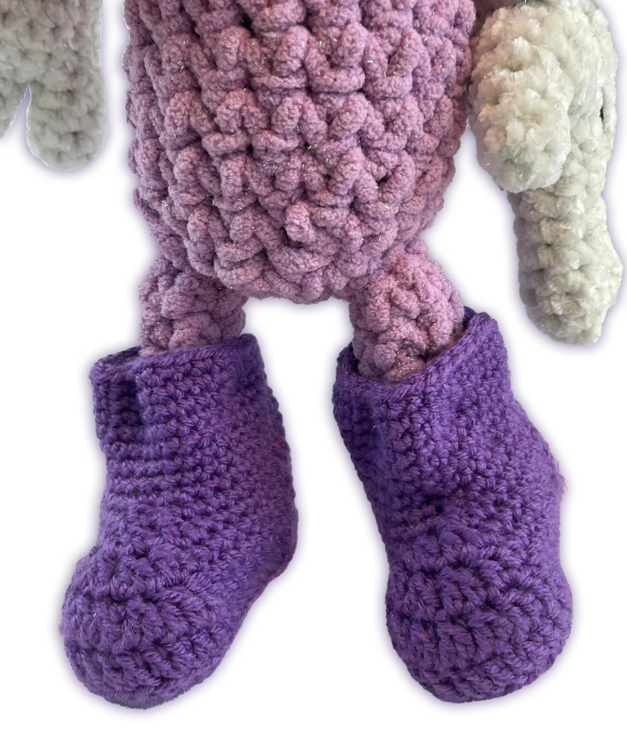 Close-up of Sofie crochet toon plush attached boots, acrylic accent detail
