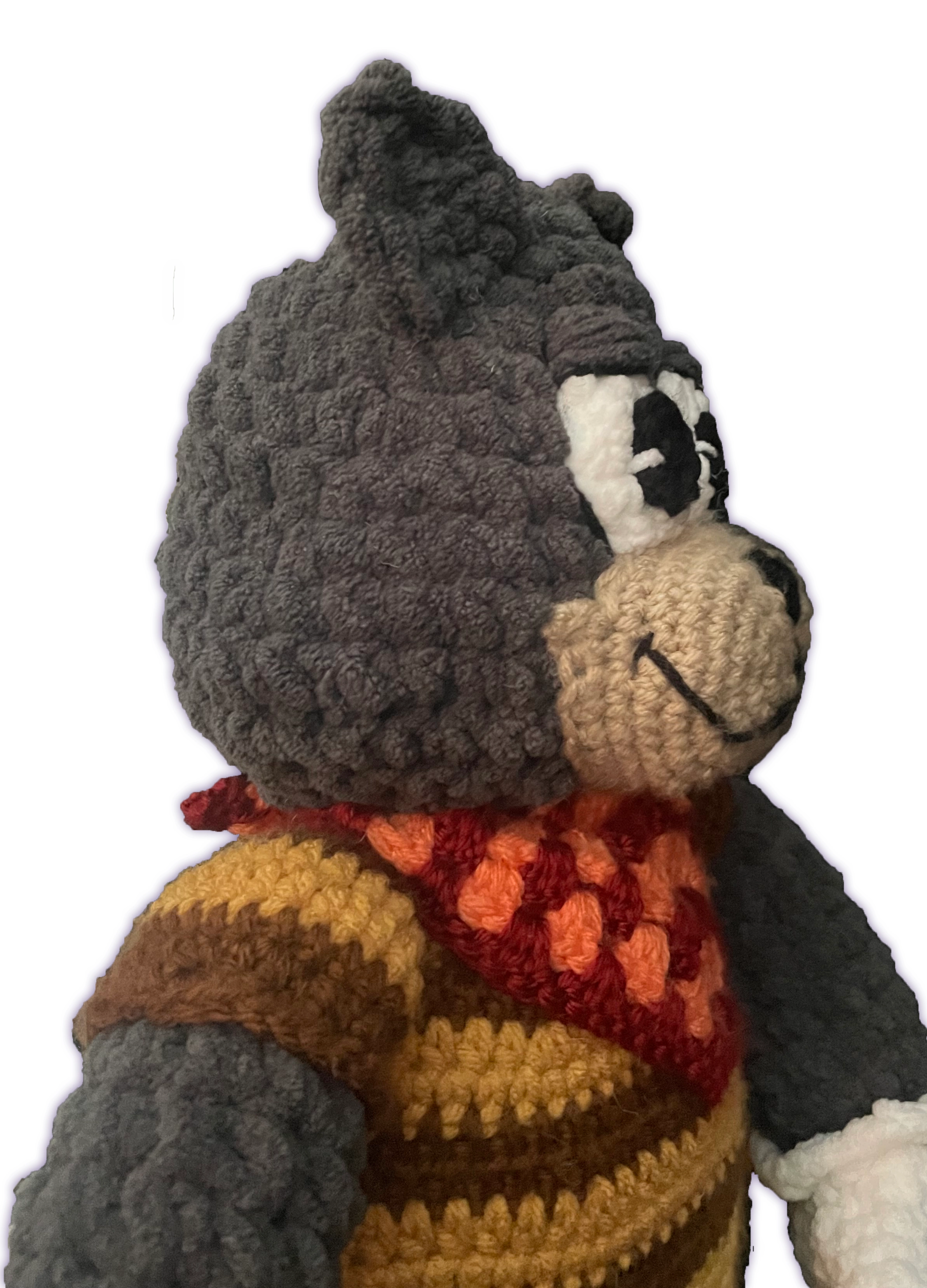 Side view of Spicy T-Bone crochet toon plush, handmade cat toon with attached clothing