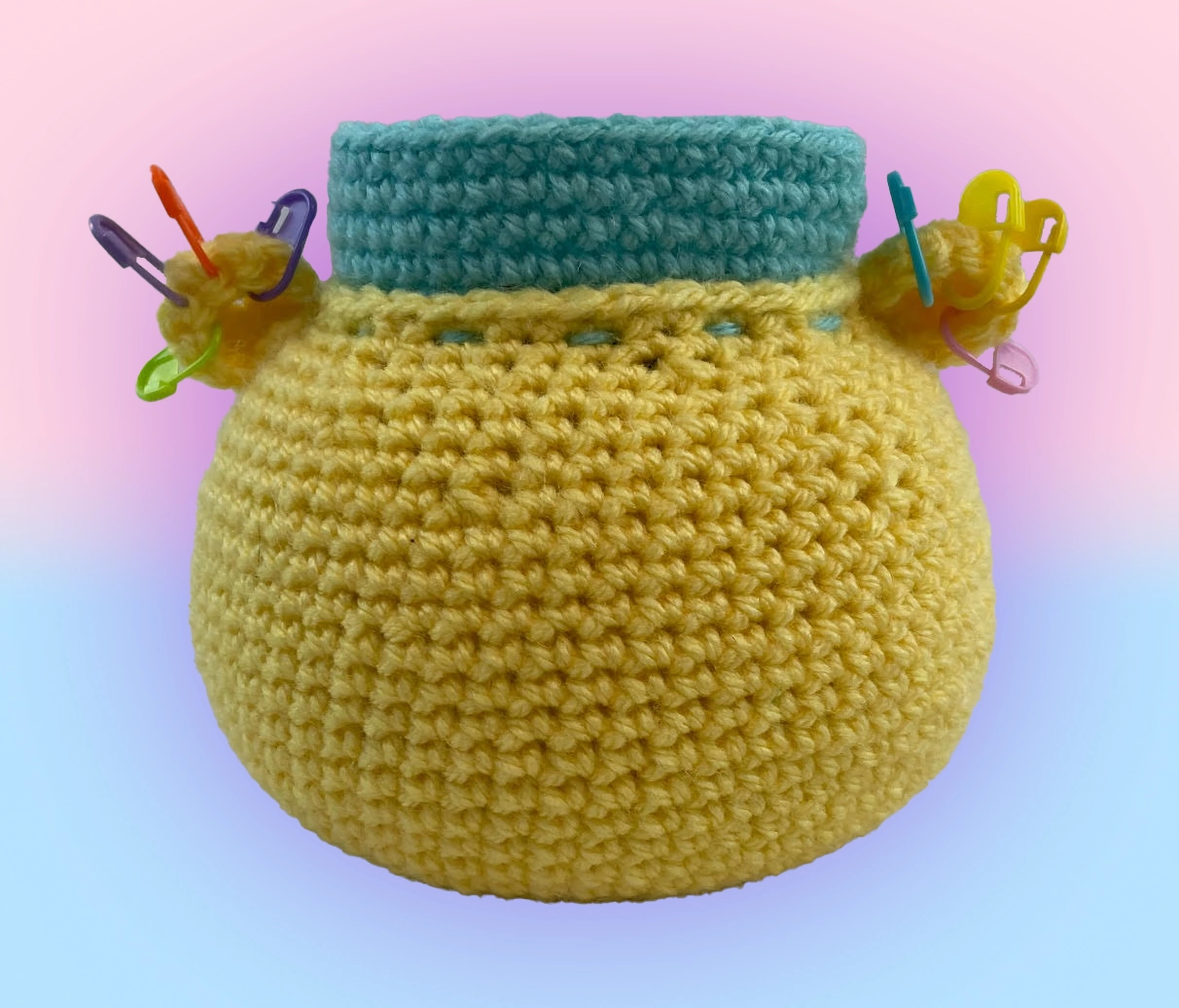 Back of crochet bear organizer with visible stitching and structure