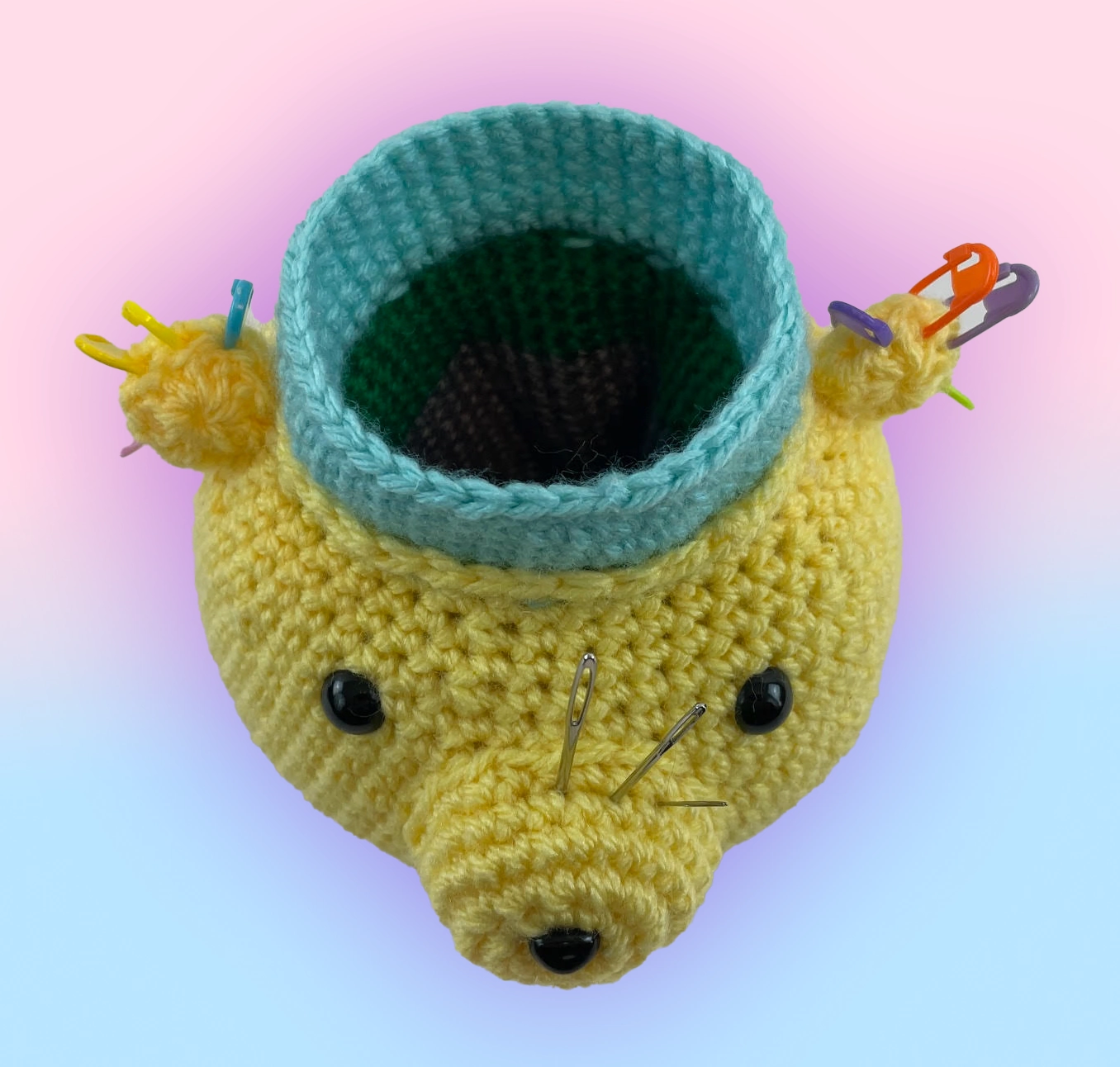Top view inside the crochet bear organizer showing storage space