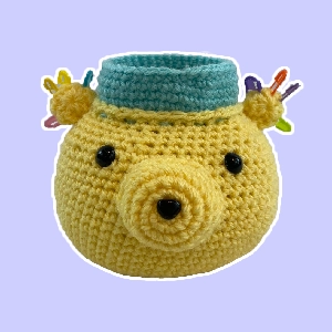 Crochet yellow bear desk organizer and pin cushion