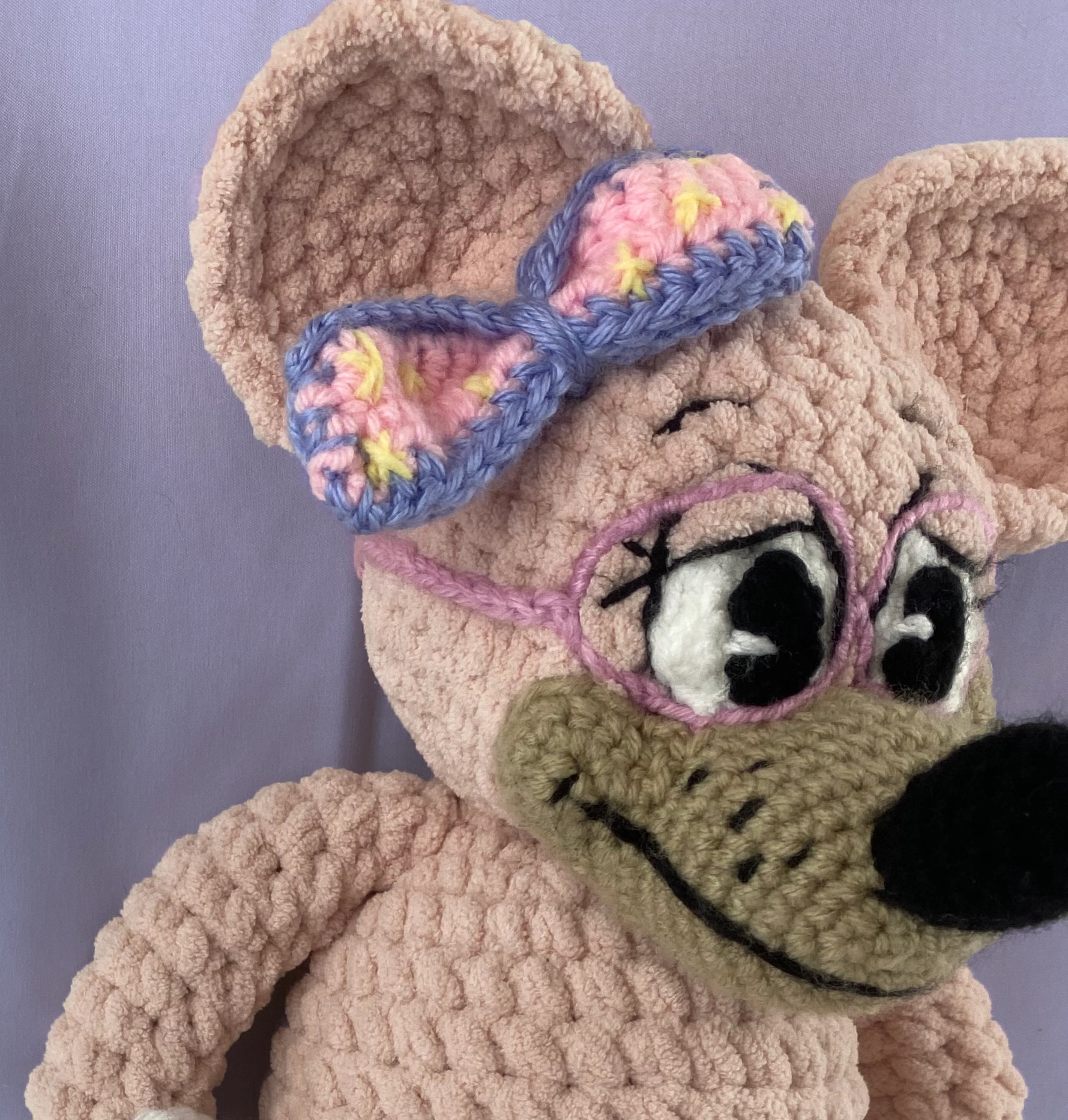 close-up of Toontown mouse's bow and pink face