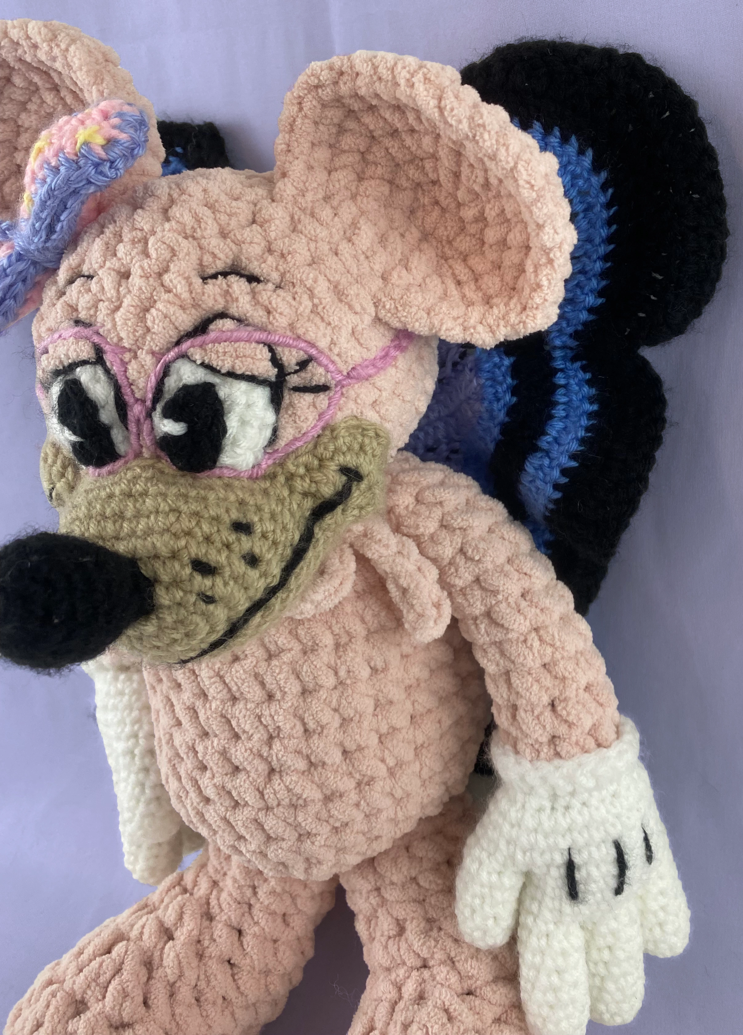 Custom mouse sitting with blue monarch wings and glasses