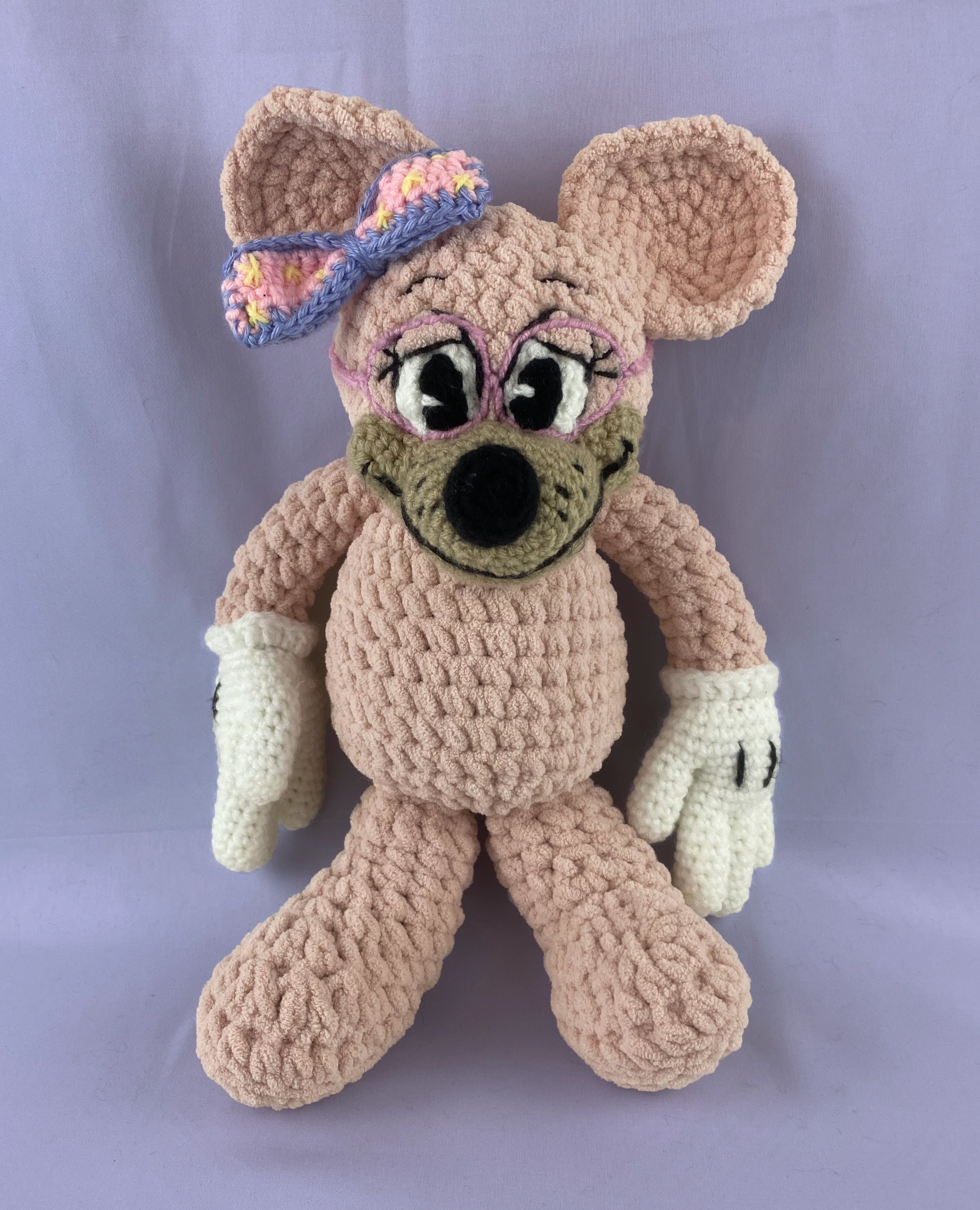 Front view of custom crochet Toontown mouse with wings unattached