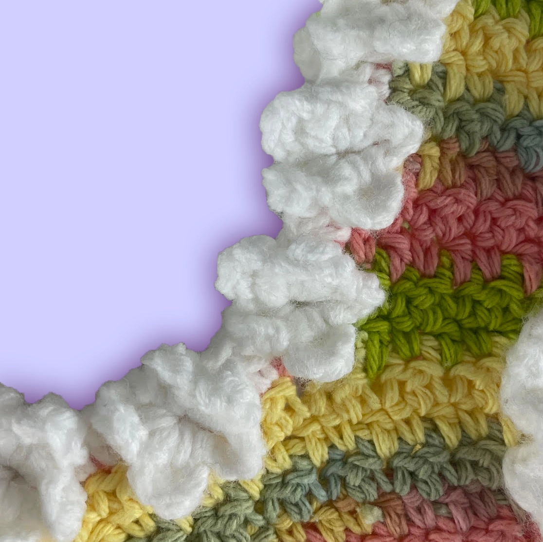 Close-up of white floral neckline on Lemon Peel Stitch Crochet Tank Top