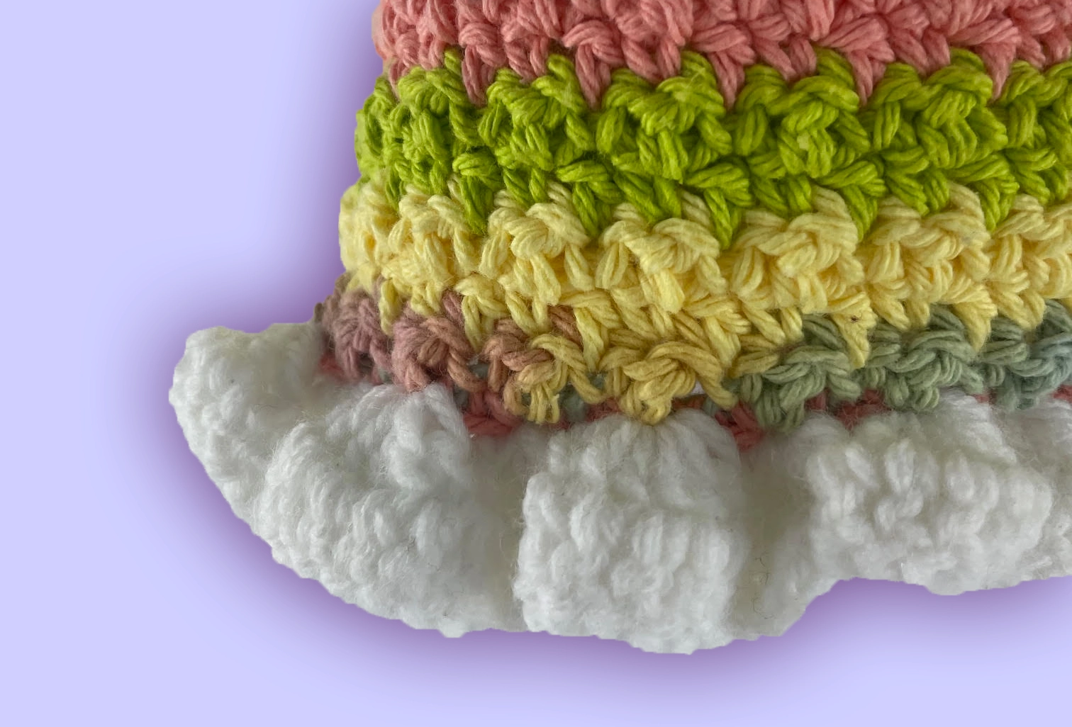 Close-up of white, acrylic ruffles on colorful Cotton Summer Tank Top