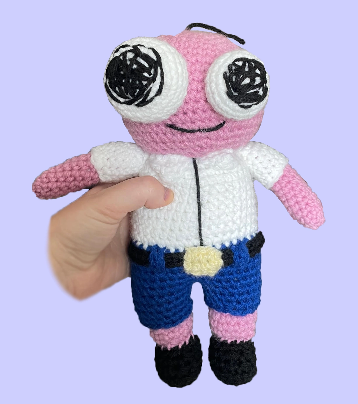 Full view of handmade crochet Pim plushie from Smiling Friends