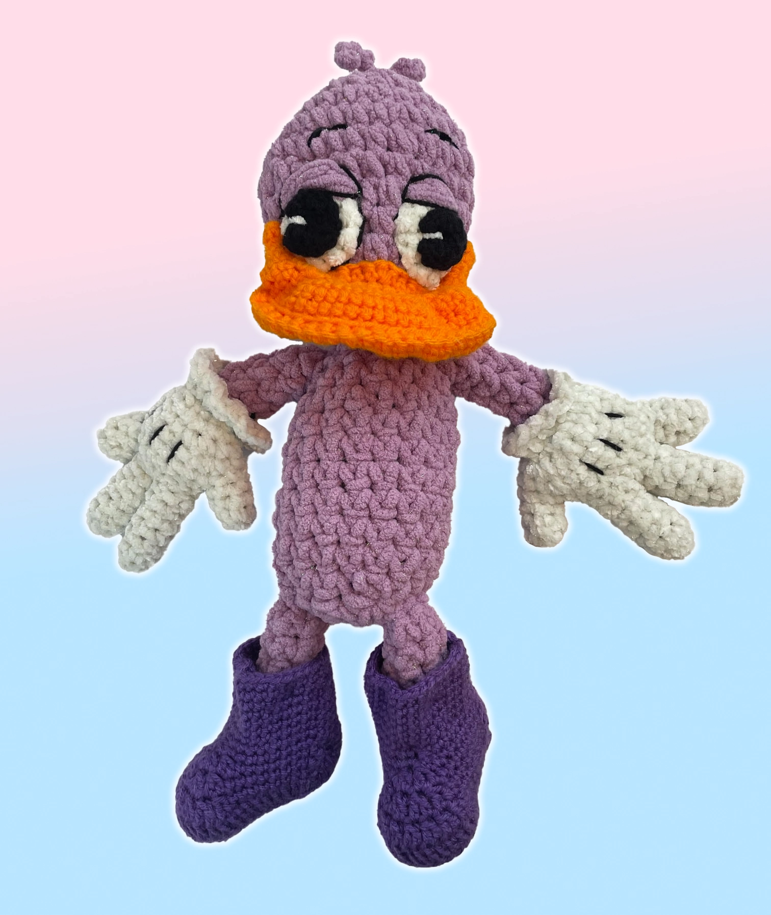 Full view of handmade purple crochet duck plushie from Toontown, custom design of Sofie